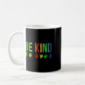 Wie ein seltsames Blatt Gebärmuttertümer-Autismus Kaffeetasse (Links)