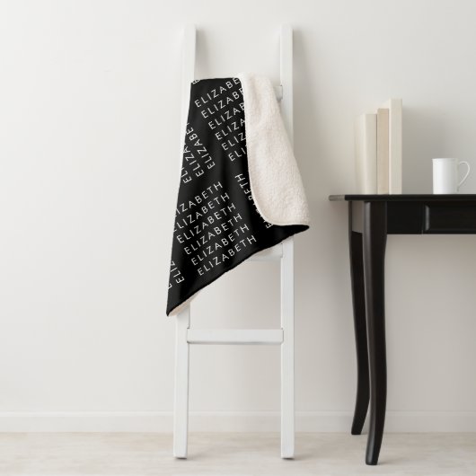 Wiederholtes Textmuster Schwarz/Weiß Sherpadecke (Beispiel)