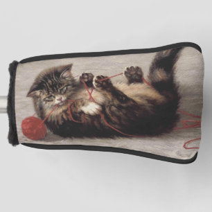 Wiegenlied der Katze, Eine Katze spielt mit einem Golf Headcover