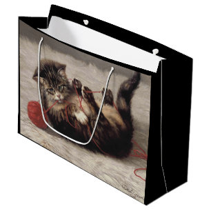 Wiegenlied der Katze, Eine Katze spielt mit einem Große Geschenktüte