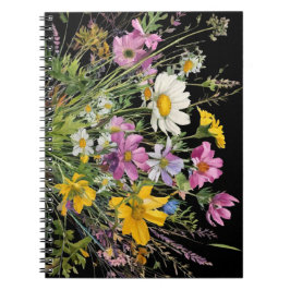 Wildblume in Aquarellfarbe auf schwarzem Hintergru Notizblock