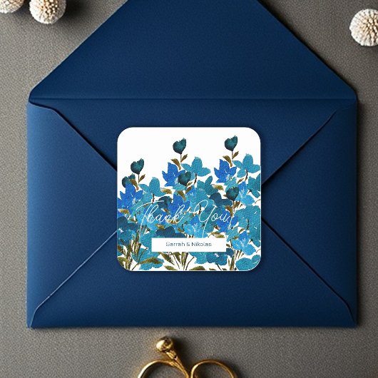 Wildblumen für künstlerisch blaues Wasser Mit Mono Quadratischer Aufkleber