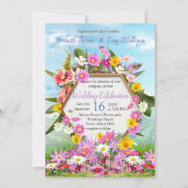 Wildblumen gegen einen blauen Himmel Einladung