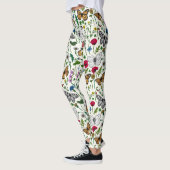 Wilde Blume und Schmetterlinge auf Weiß Leggings (Links)