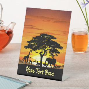 Wilde Tiere auf der afrikanischen Savanna Sunset Sockelschild