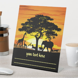 Wilde Tiere auf der afrikanischen Savanna Sunset Sockelschild