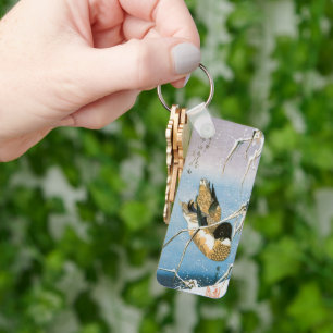 Wildenten schwimmend Schnee beladene Schilfrohre v Schlüsselanhänger