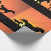 Wildpferde-Sonnenuntergangs-Silhouette Geschenkpapier
