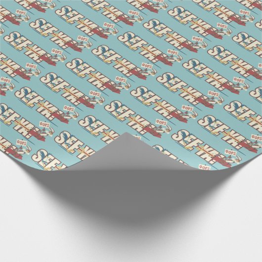 Wile E. Coyote Rocketing Past ROAD RUNNER™ Geschenkpapier (Ecke)