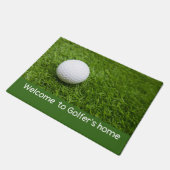 Willkommen auf der Golfer-Zuhause mit Golfball auf Fußmatte (Schrägansicht)