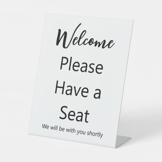 Willkommen Bitte setzen Sie sich mit einem weißen Sockelschild (Vorderseite)