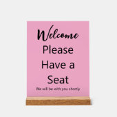 Willkommen Bitte setzen Sie sich mit rosa und schw Acrylschild (Vorderseite)