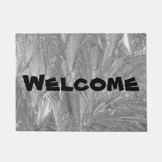 "Willkommen" der Türmatte mit dem komplizierten Fr (Vorderseite)