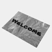 "Willkommen" der Türmatte mit dem komplizierten Fr (Schrägansicht)