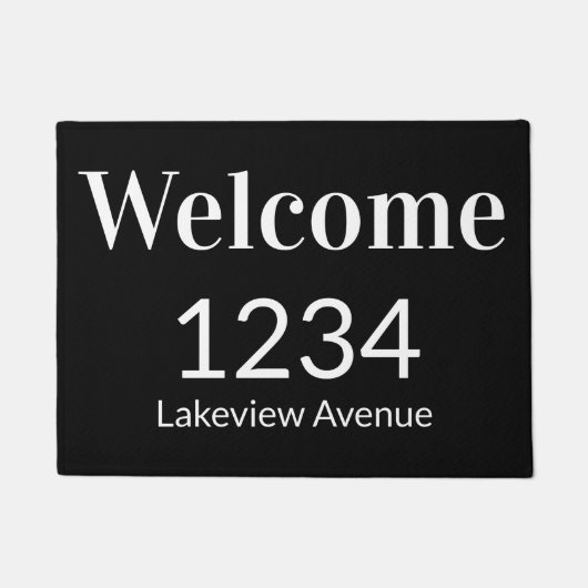 Willkommen in Schwarz/Weiß-Haus-Nummer Fußmatte (Vorderseite)