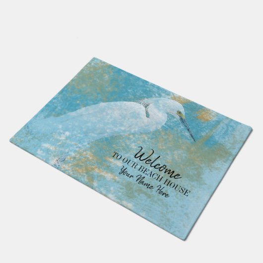 Willkommen in unserem Beach House Snowy Egret Cust Fußmatte (Schrägansicht)
