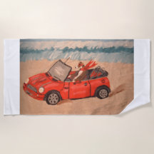 Windhund in rotem Auto am Strand