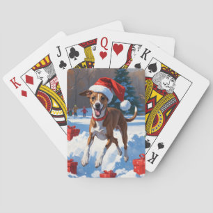 Windhund läuft im Schnee mit Weihnachtsmütze Spielkarten