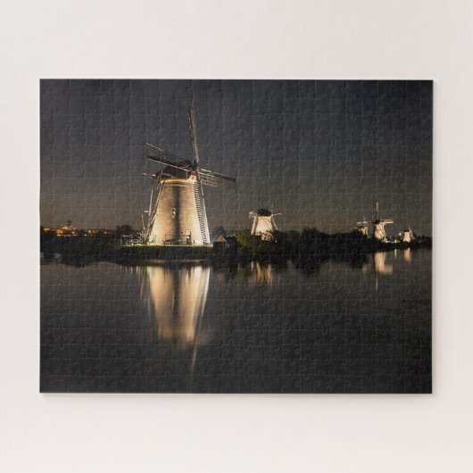 Windmills and water illuminated at night puzzle (Horizontal)