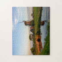 Windmühle in der Landschaft in Holland-Laubsäge