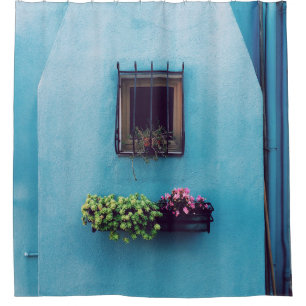 WINDOW WITH FRAME ABOVE GREEN AND PINK PETALED FLO DUSCHVORHANG