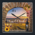 Wine OClock Vineyard Landscape Clock Quadratische Wanduhr<br><div class="desc">It's always Wine O'Clock artistic wall clock featuring a wine bottle, glasses, grapes, lantern and sunflower on Roman arch overlooking a painting of a vineyard landscape. The clock numbers on Member and can be deleted if you do not need them. Für alle Optionen, Choose "customize it" oder "personalize". Beautiful for...</div>