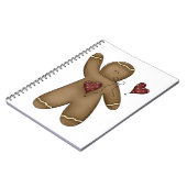 Winkender Weihnachtsmann aus Lebkuchen mit gepunkt Notizblock (Linke Seite)