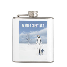 Winter Greetings. Female elf walking in the snow  Flachmann