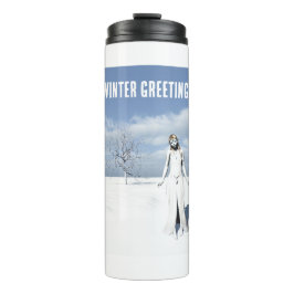 Winter Greetings. Female elf walking in the snow  Thermosbecher