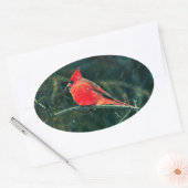 Winter-Kardinal im Schneesturm - Verbessert Ovaler Aufkleber (Umschlag)