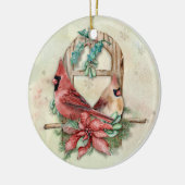 Winter-Kardinal verbinden sich mit Poinsettia Keramikornament (Links)