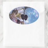 Winter Pine Cones unter einem Sternenhimmel Ovaler Aufkleber (Tasche)