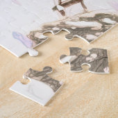 Winter snowy village, children playing, pink hues puzzle (Seite)