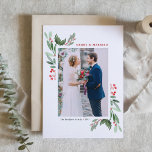 Winterberry und Holly Wedding Weihnachts-Foto Feiertagskarte<br><div class="desc">Feiern Sie Ihr erstes Weihnachtsfest als verheiratetes Paar mit unserer individuell gestaltbaren Weihnachtskarte für Fotos mit Aquarellholz und Winterbeere. Dieses elegante Design kombiniert die zeitlose Schönheit von heiligen Blätter und Winterbeeren mit einem zarten Aquarelleffekt und schafft so einen festlichen und romantischen Look, der perfekt für frisch verheiratete Gäste ist. Personalisieren...</div>