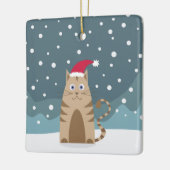 Winterferien Weihnachtsmannmütze Katze schneebedec Keramikornament (Links)