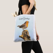 Wintergrüße. Robin singend  Tasche (Von Nahem)