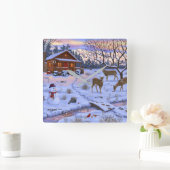 Winterhütte Hirsch in Schneeschweihnachtszene Quadratische Wanduhr (Zuhause)