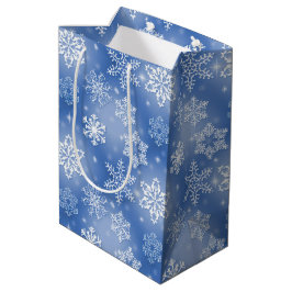Winterschneeflocken auf blau mittlere geschenktüte