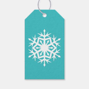 Winterschneeflocken auf dem Türkisschild Geschenkanhänger