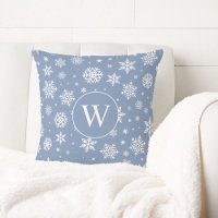 Winterschneeflocken auf hellblauer Monogram
