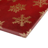 Winterschneeflocken in Rot und Gold Schneidebrett (Ecke)