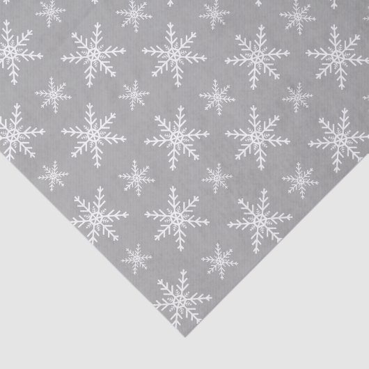 Winterschneeflockenmuster auf Grau Seidenpapier (Ausschnitt)
