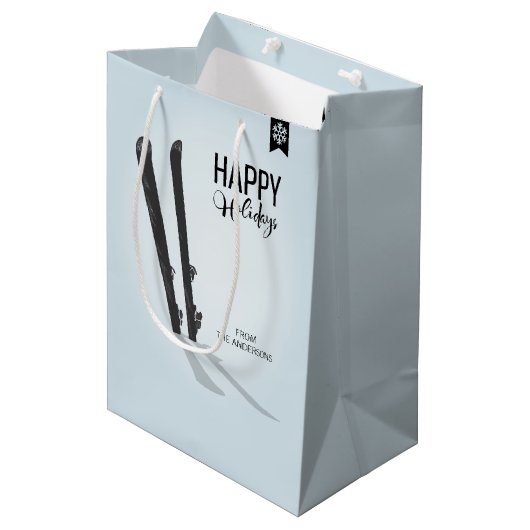 Winterskifahren Happy Holidays - Geschenktasche Mittlere Geschenktüte (Vorderseite Schrägansicht)