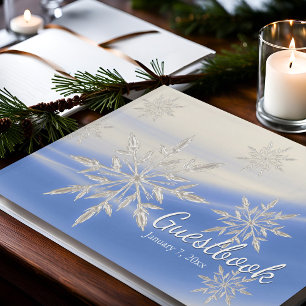 Winterweiße und blaue Schneeflocken Gästebuch
