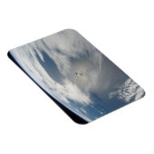 Winzige Satelliten umkreisen über einem Teil der E Magnet (Rechte Seite)