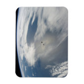 Winzige Satelliten umkreisen über einem Teil der E Magnet (Vertikal)