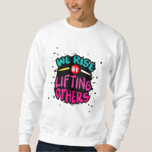 Wir erheben uns, indem wir andere aufheben - Inspi Sweatshirt