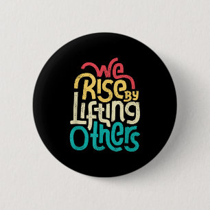 Wir erheben uns, indem wir andere erheben - Motivi Button