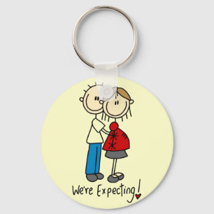 Wir erwarten Baby-T-Shirts und Geschenke Schlüsselanhänger