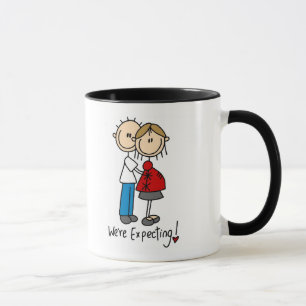 Wir erwarten Babyt-shirts und -geschenke Tasse